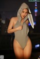 A woman in a bunny costume posing for a picture.